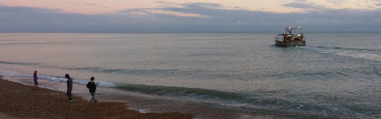 Fish boat heading out to sea Hastings Sue Ranger