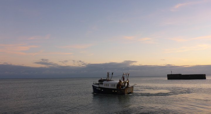 Boat leaving Hastings harbour Peter Richardson