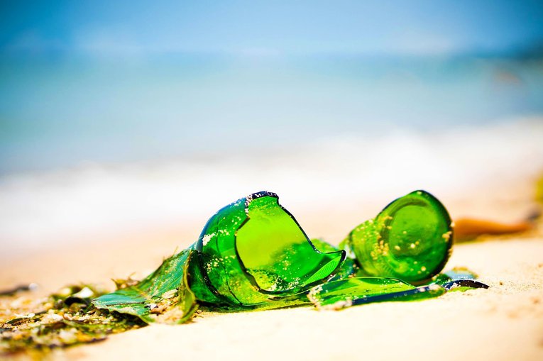 Broken glass bottle on a beach