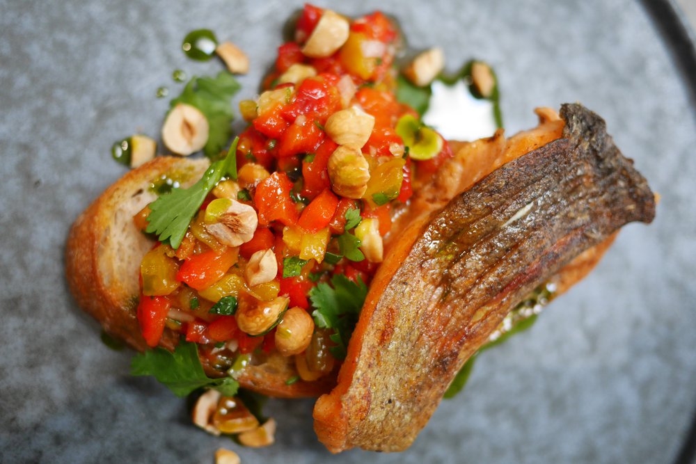 Panfried Cajun trout fillet with red pepper & hazelnut salsa Marine