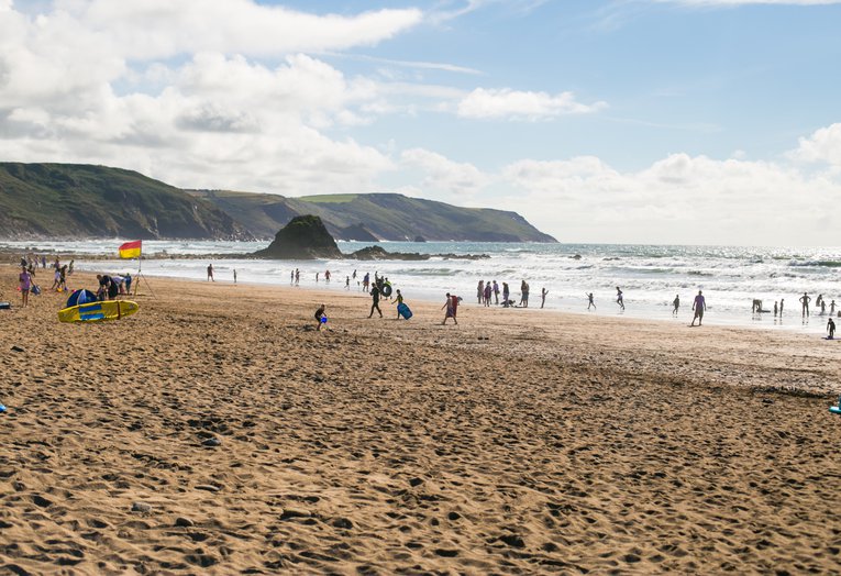 People on Widemouth Bay beach Cornwall Natasha Ewins